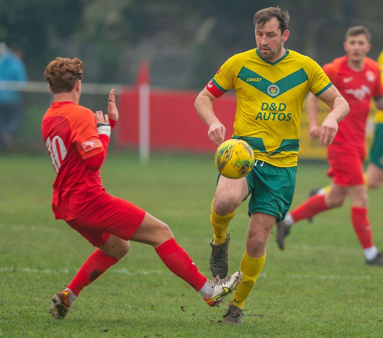 Ashford defender Liam Friend takes charge of the situation Picture: Ashford United