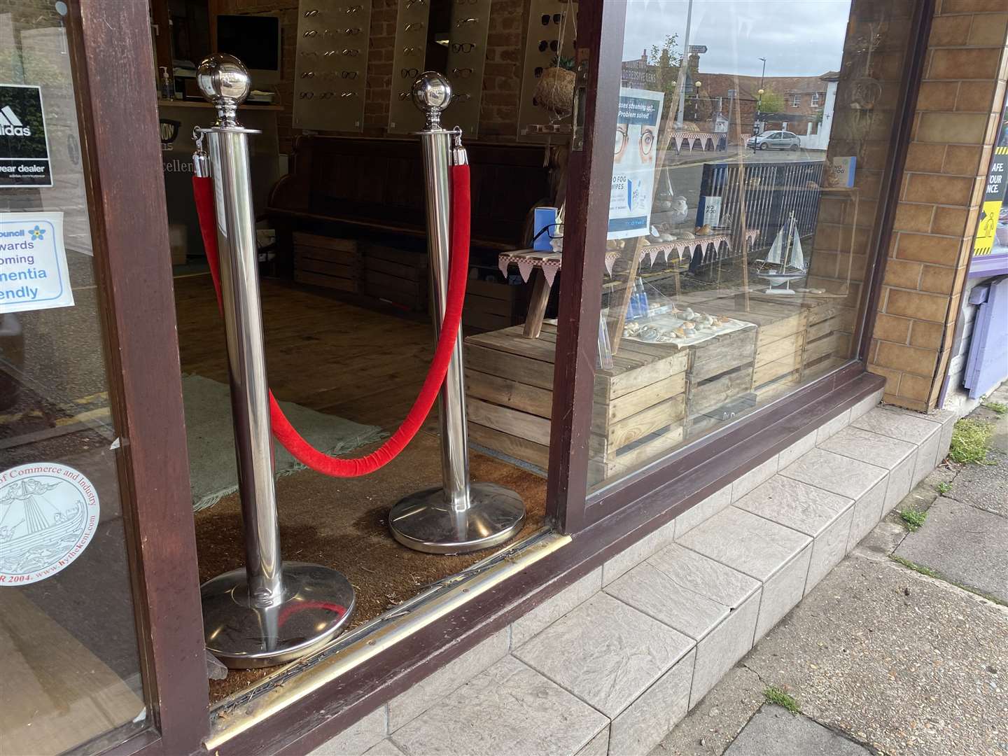 A barrier has been put over the entrance of David Snow Opticians in Hythe, due to wet carpet