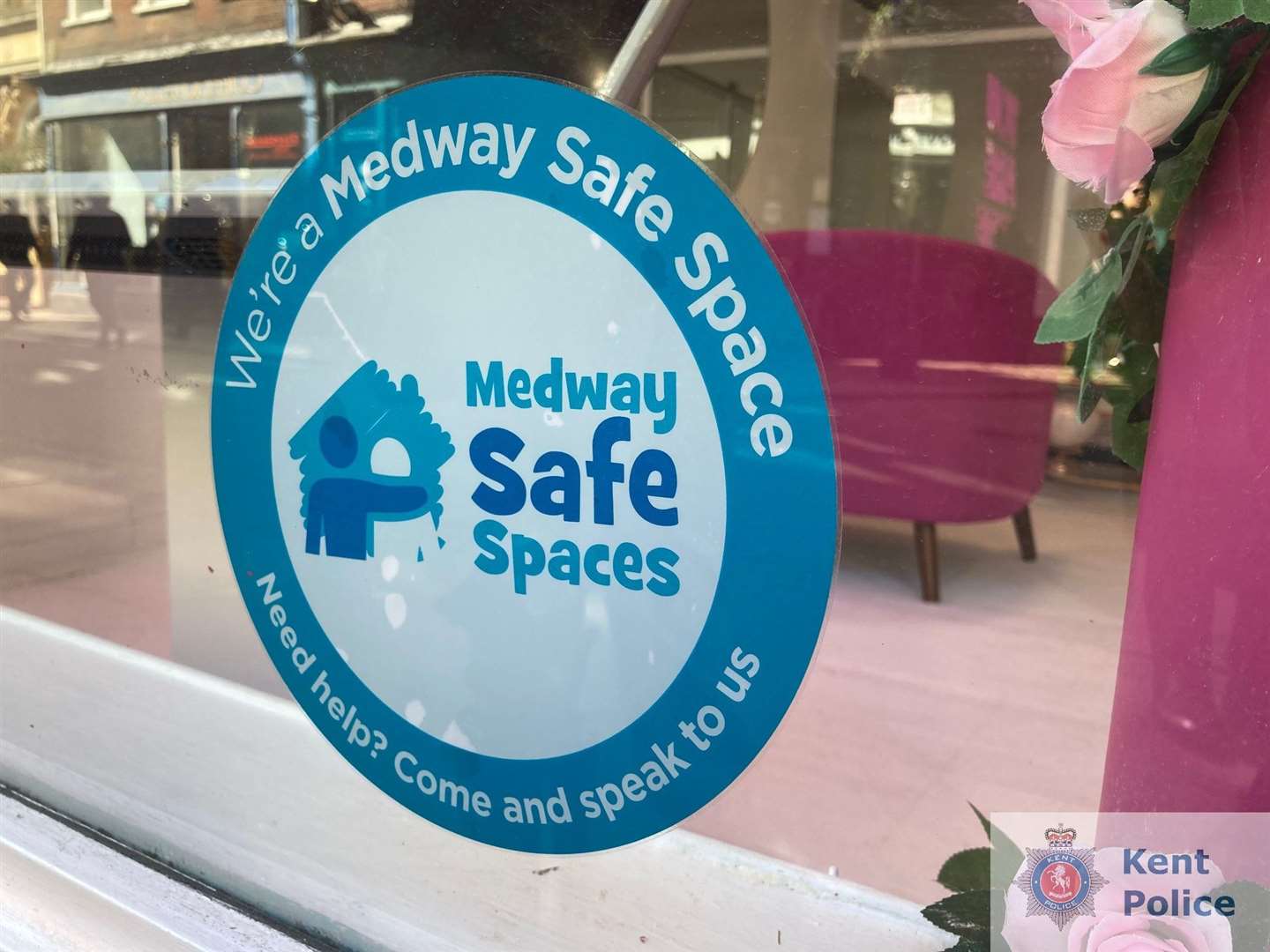 Window stickers displayed by businesses in Rochester High Street in the Safe Spaces initiative. Picture: Kent Police