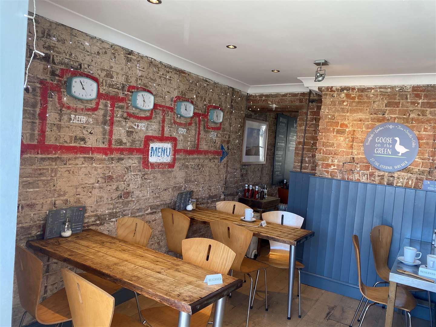 The interior of the cafe makes good use of old brickwork