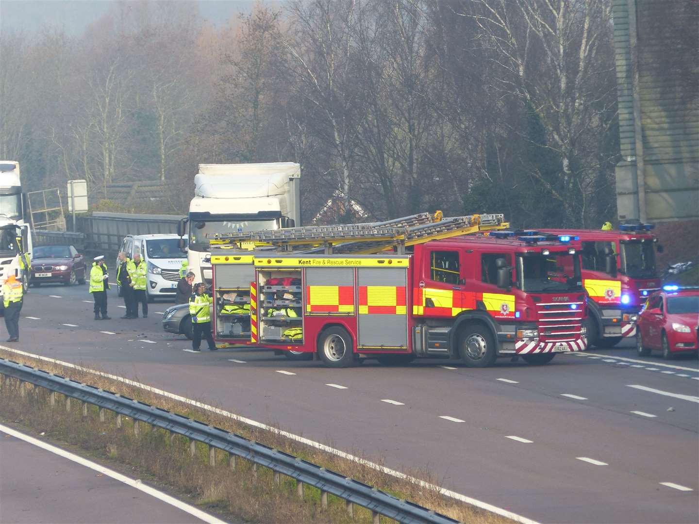 Emergency services at the scene of the crash. Picture: Andy Clark