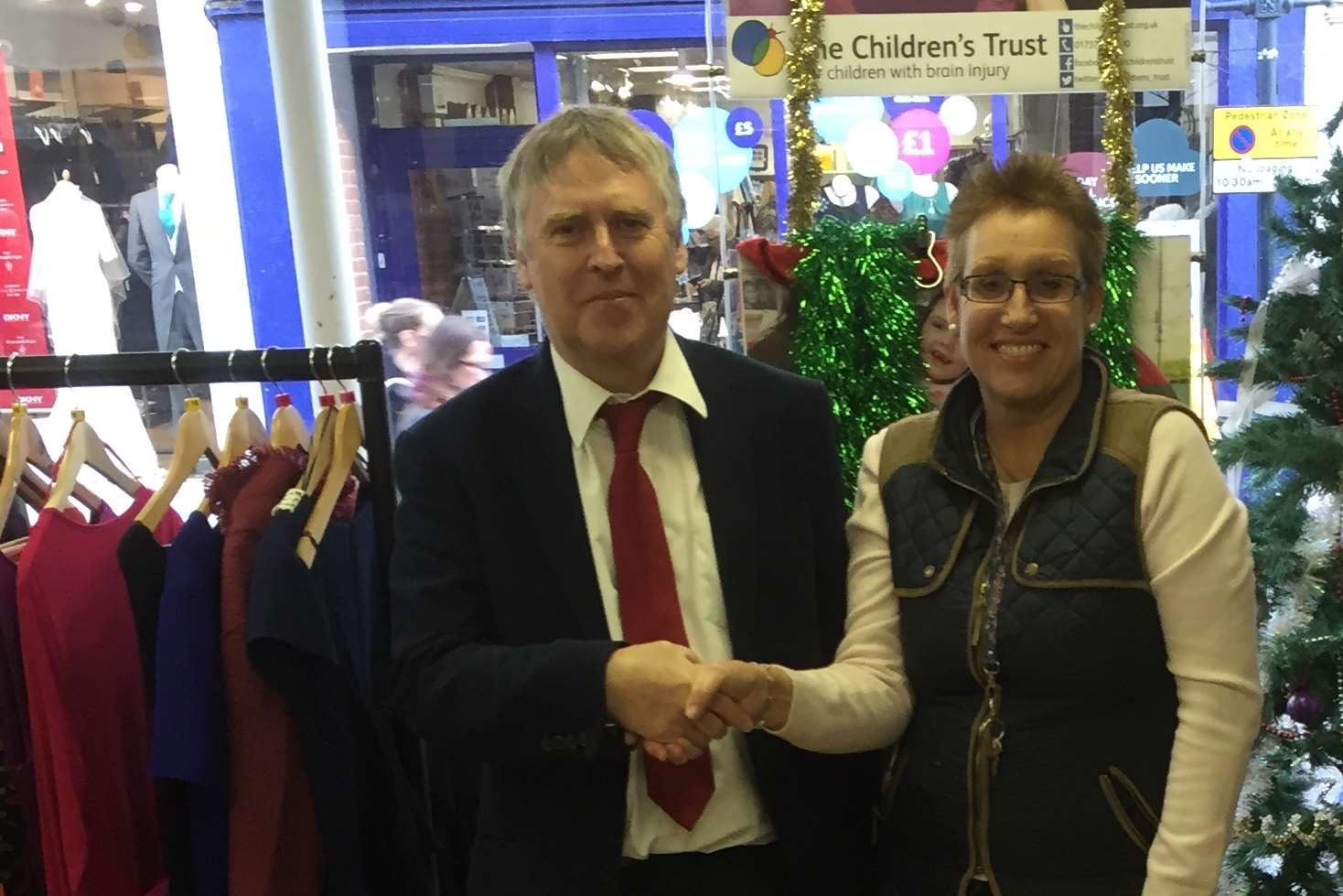 Shop Manager Mandy Tucker with winner of the toy car, Ron Moys