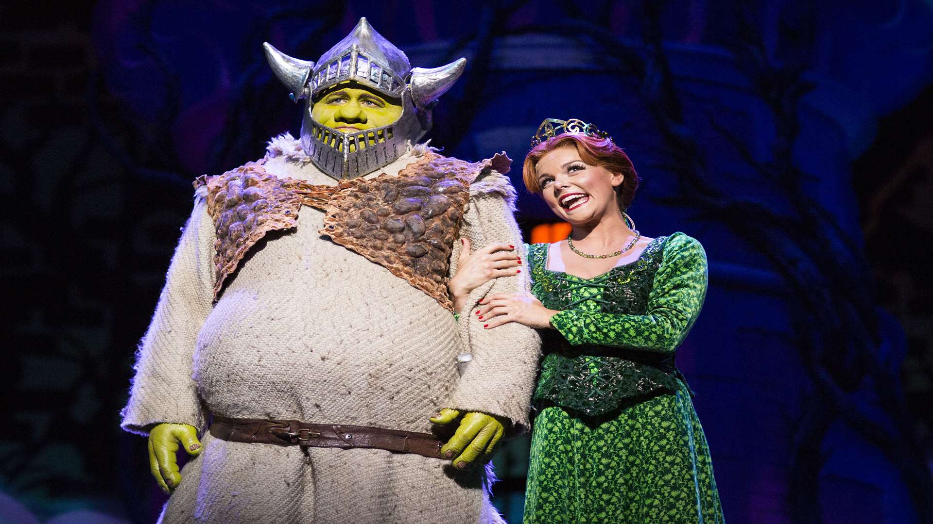 Dean Chisnall (Shrek) and Faye Brookes (Princess Fiona) Pic: Helen Maybanks