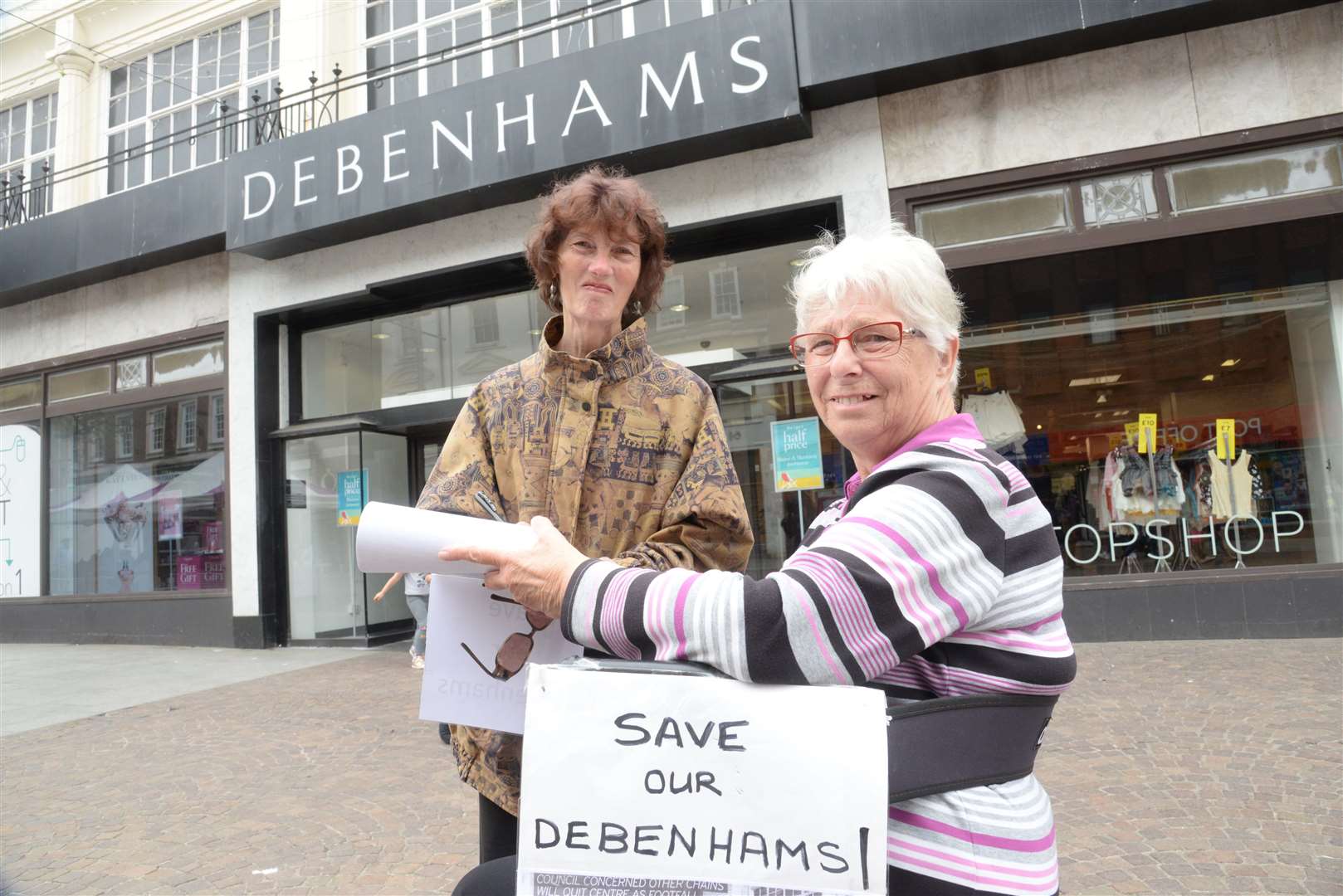 Rose Wattam signs the petition for Jean Spain outside Debenhams in Sandgate Road, Folkestone