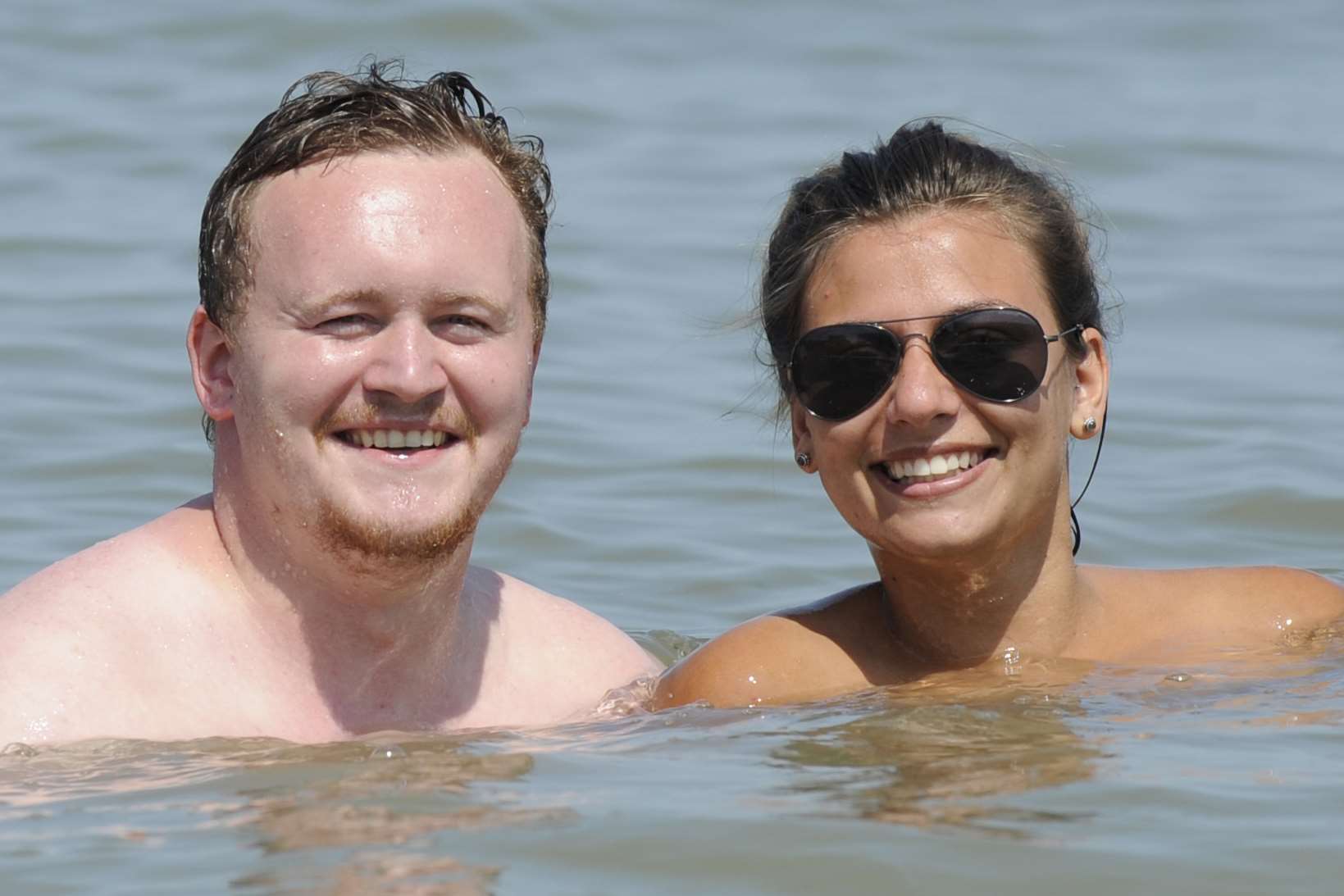 Jack Brewster and Kara Millington take a dip in Herne Bay