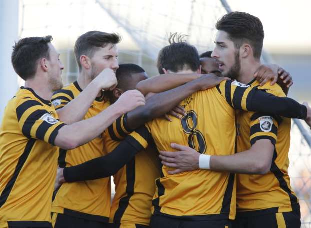Joe Healy (No.8) celebrates his opener with Maidstone team-mates Picture: Martin Apps