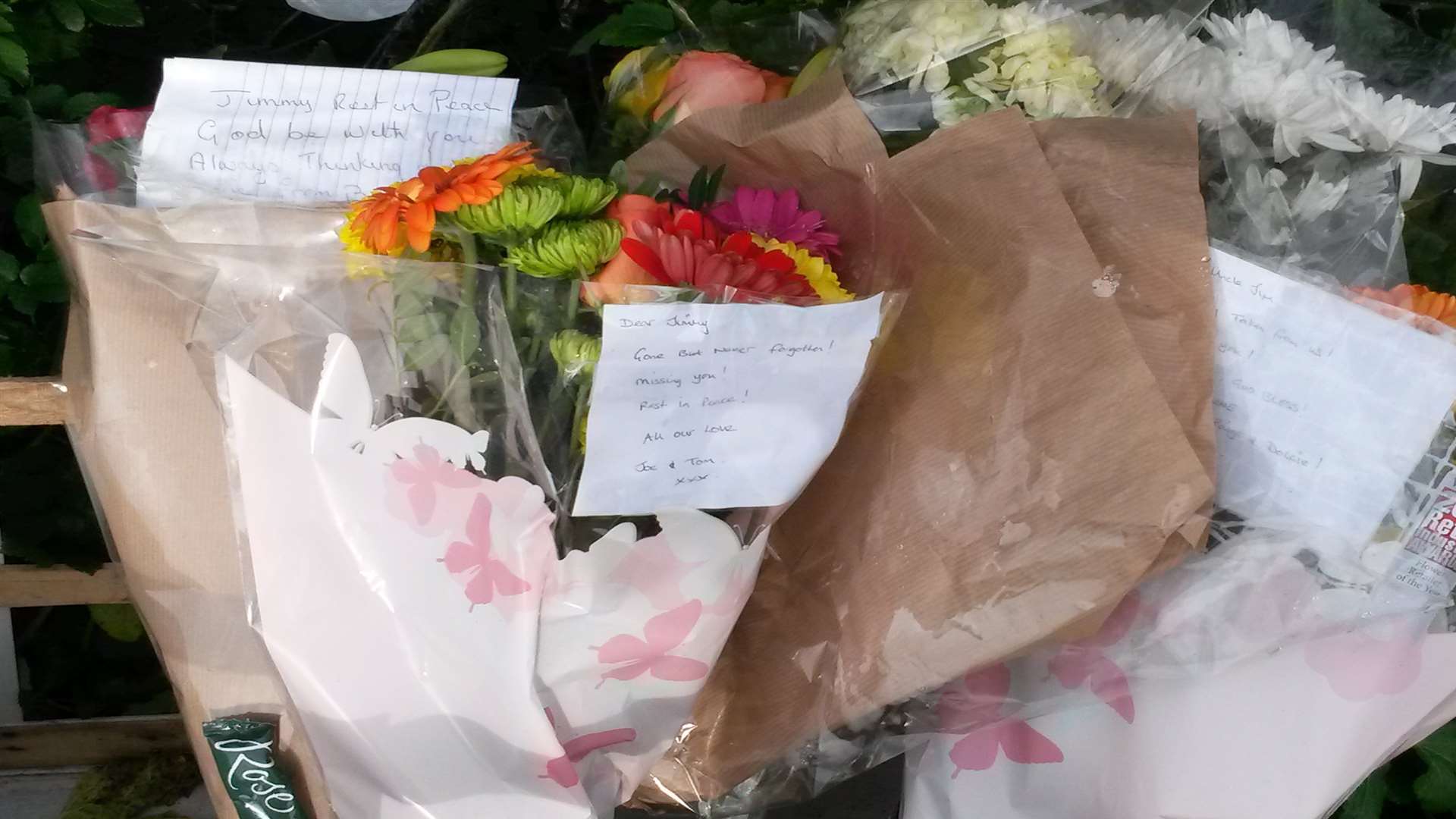 Floral tributes left a the site where Mr Breaker used to sell fruit and veg