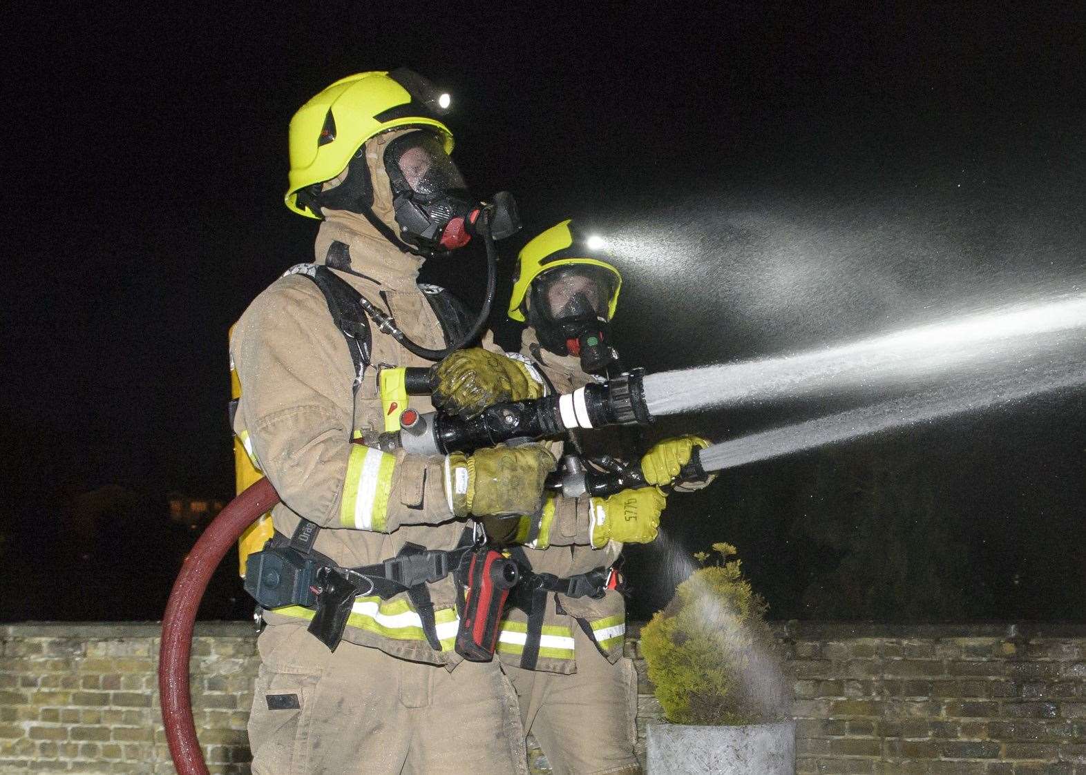 Firefighters wearing breathing apparatus tackled the flames. Stock picture