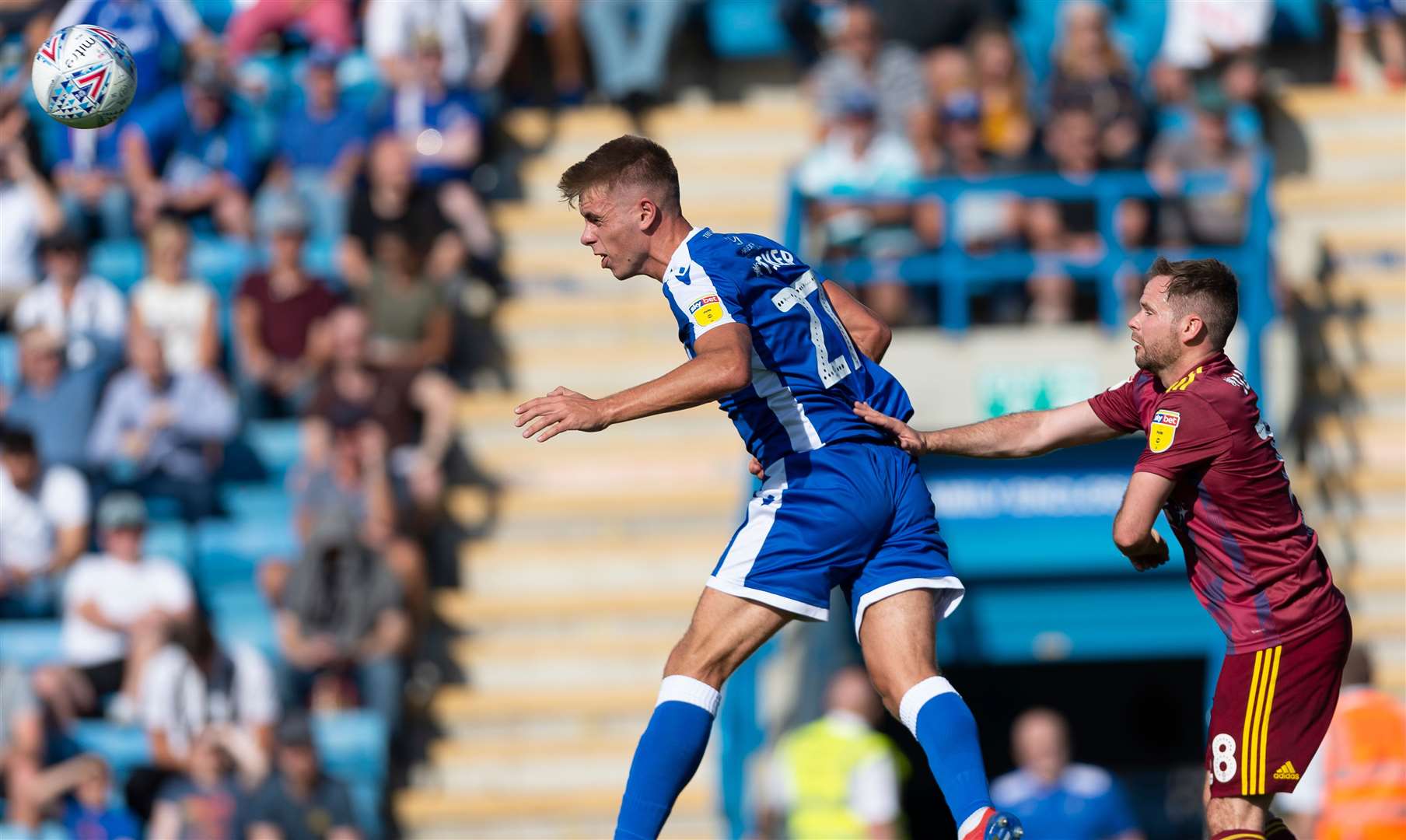 .Jack Tucker clears with his head in Gillingham's game against Ipswich Town Picture: Ady Kerry