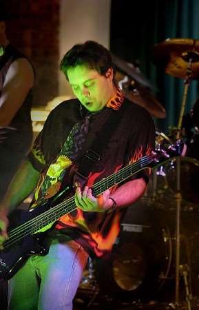 Graduate and musician Adrian Milton, 27, played bass guitar with the group Self Titled