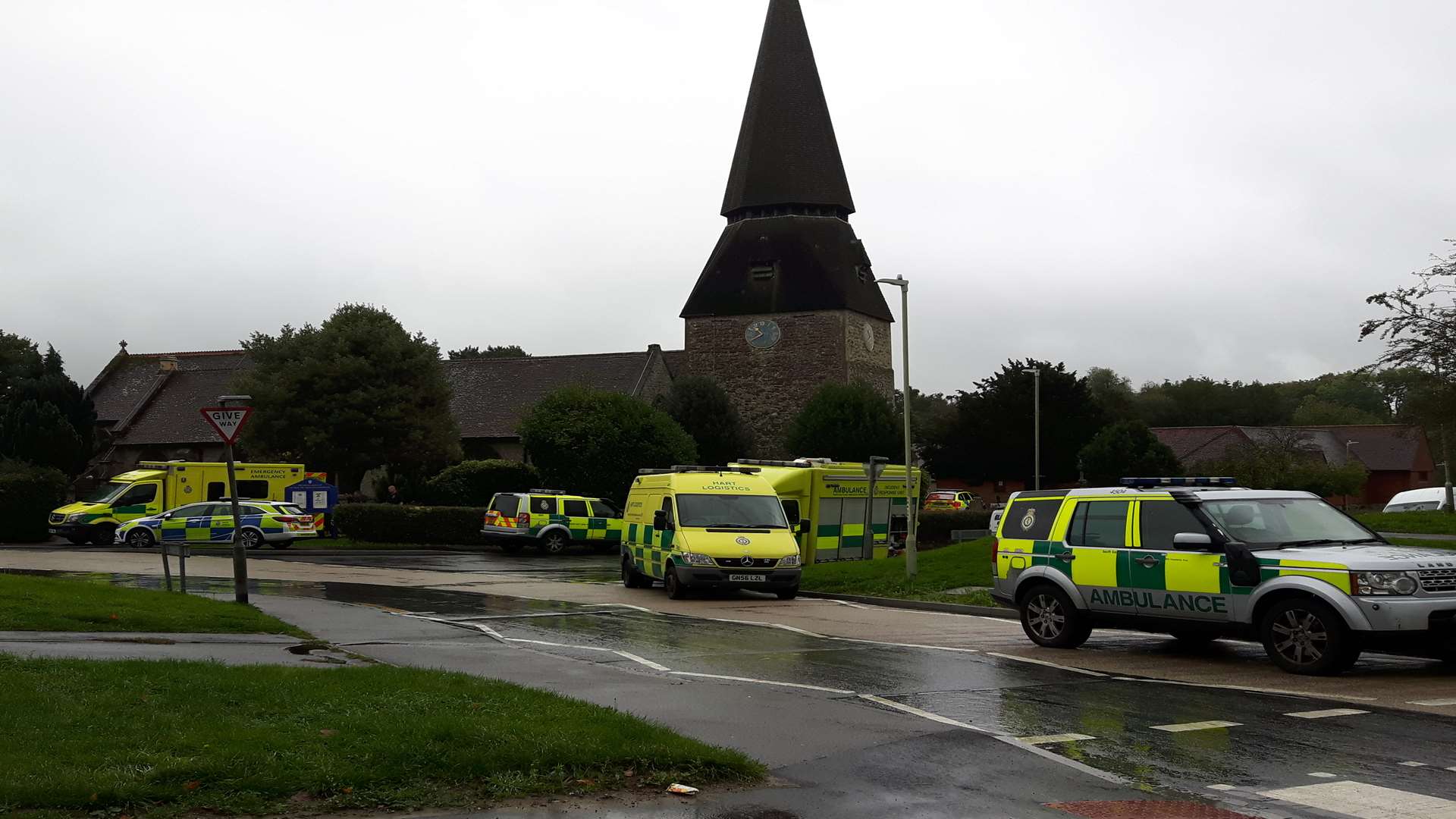 Police and the ambulance service at the scene near St Mary the Virgin Church