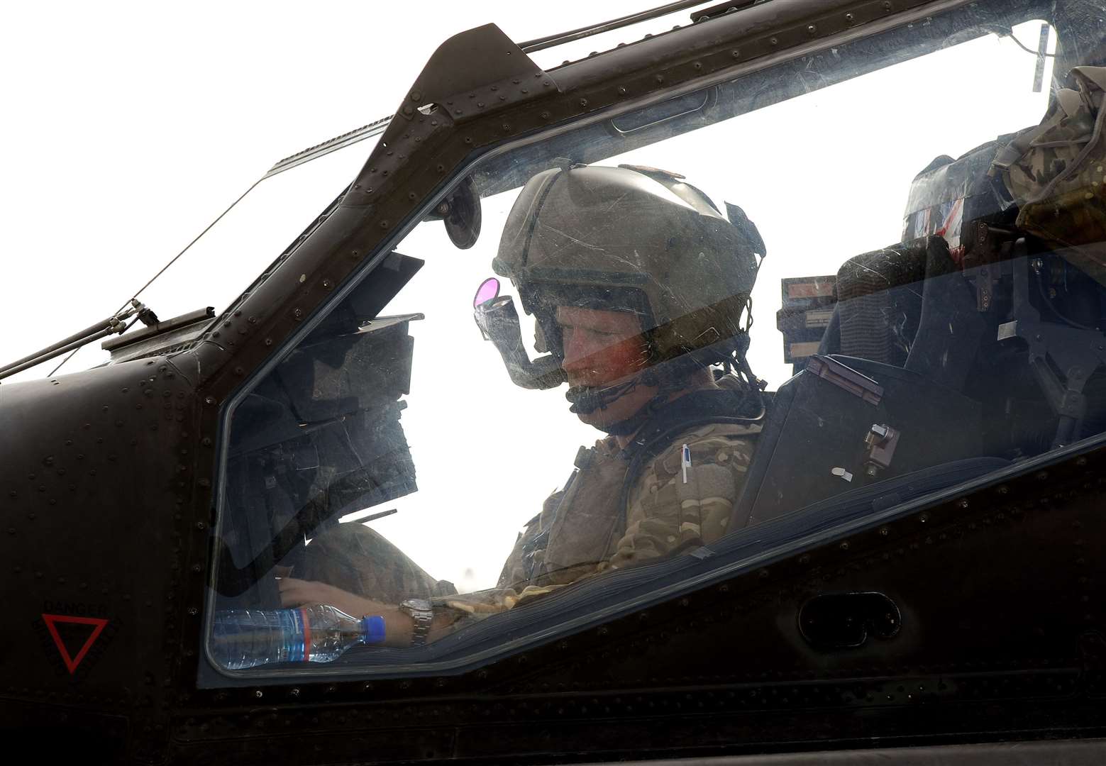 Harry in the cockpit of his Apache helicopter in Afghanistan (John Stillwell/PA)