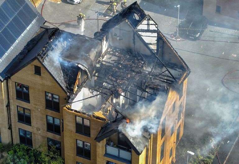 Damage caused by a roof fire at flats in Eden Road, in Langley, Maidstone. Picture: UKNIP
