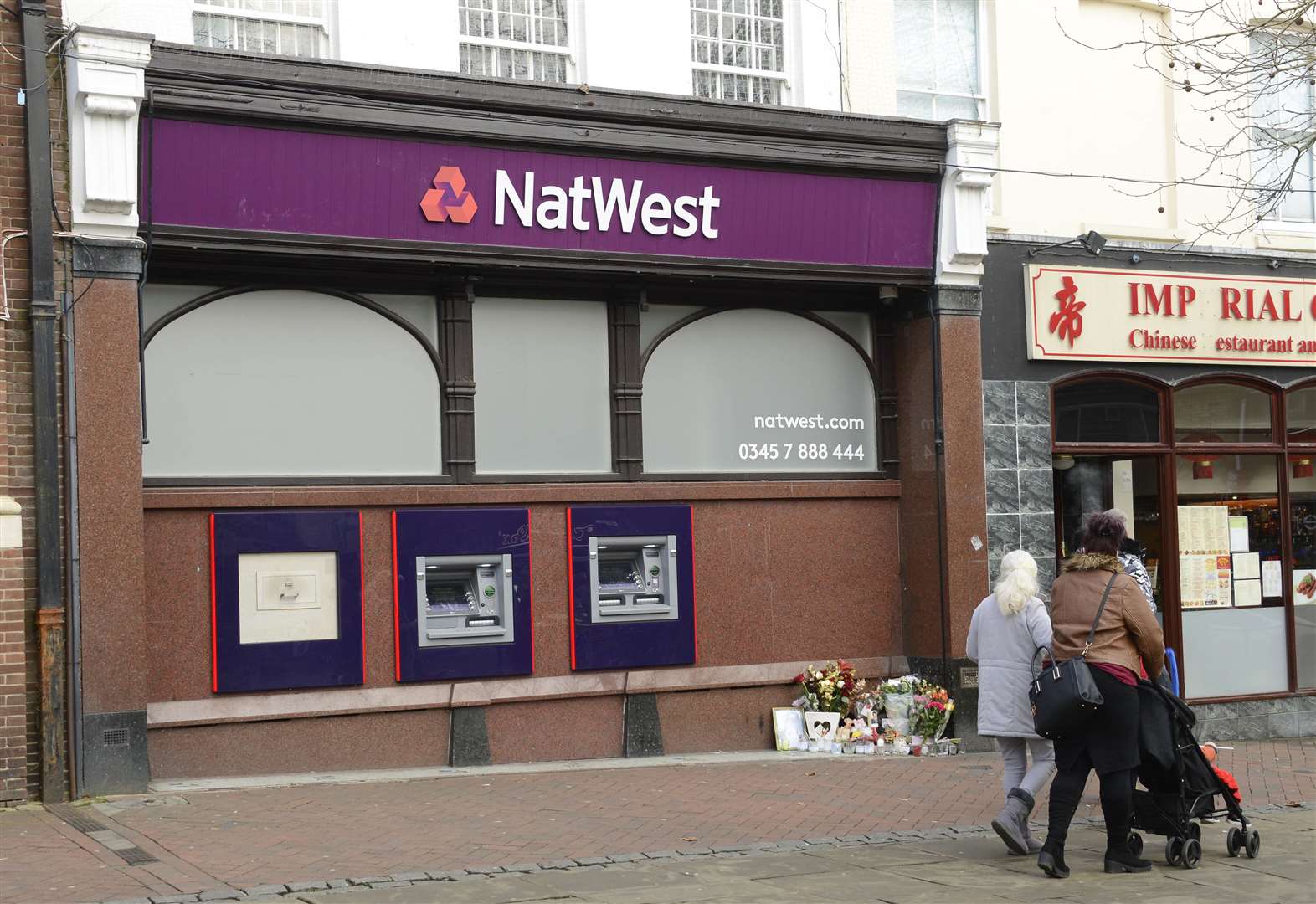 Flowers and cards have been placed in memory to mother Lisa Smith, at Natwest in Ashford Picture: Paul Amos