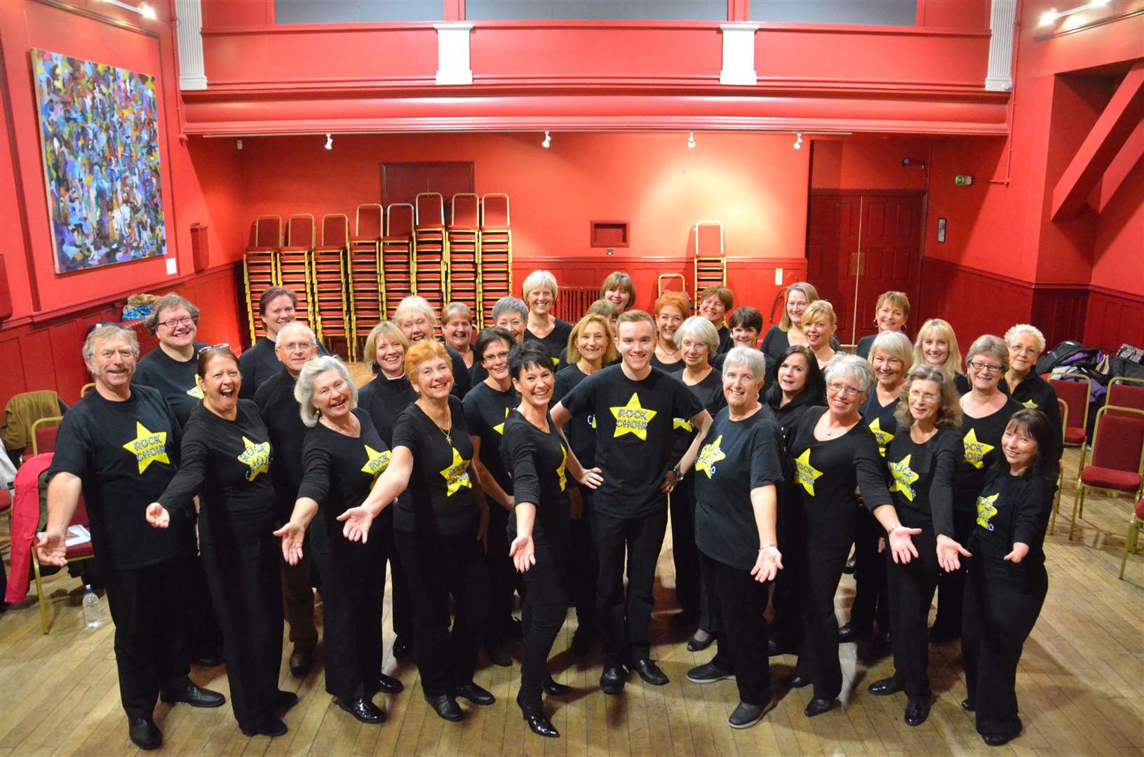 East Kent Rock Choir leader Jonathan Grosberg with his Deal choir which meets at the Astor Theatre