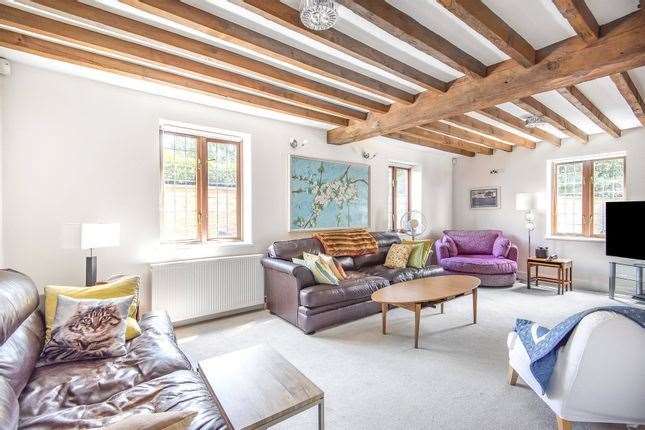 The lounge inside Hill Cottage, a former coach house. Picture: Zoopla