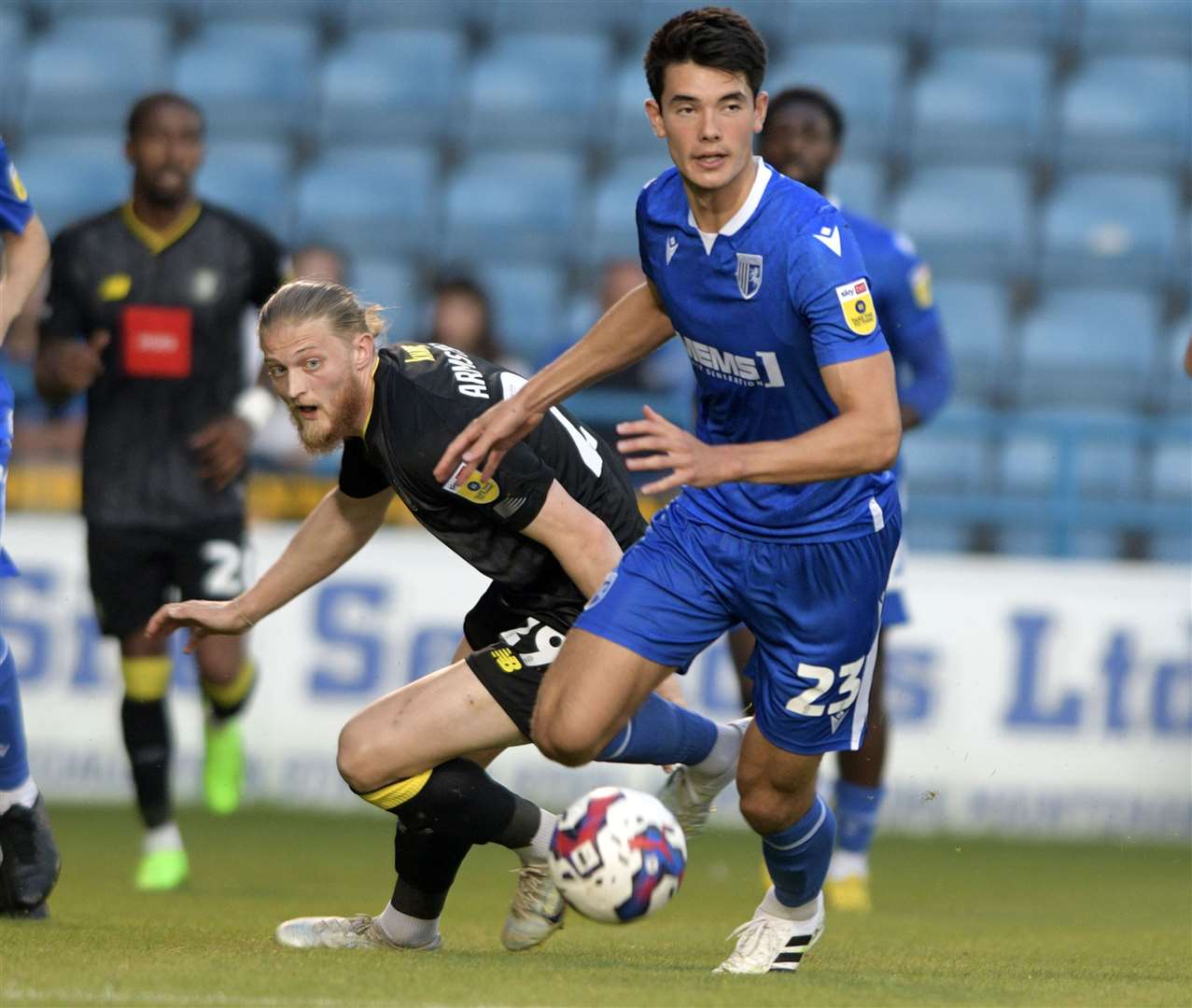 Defender Elkan Baggott pushes forward for Gillingham in Tuesday night's defeat to Harrogate. Picture: Beau Goodwin