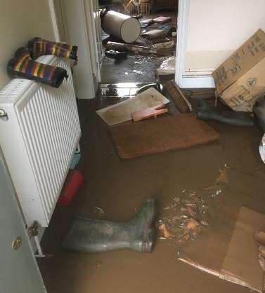 Helen Whately was forced to evacuate her home as muddy water flowed through her home (2284541)