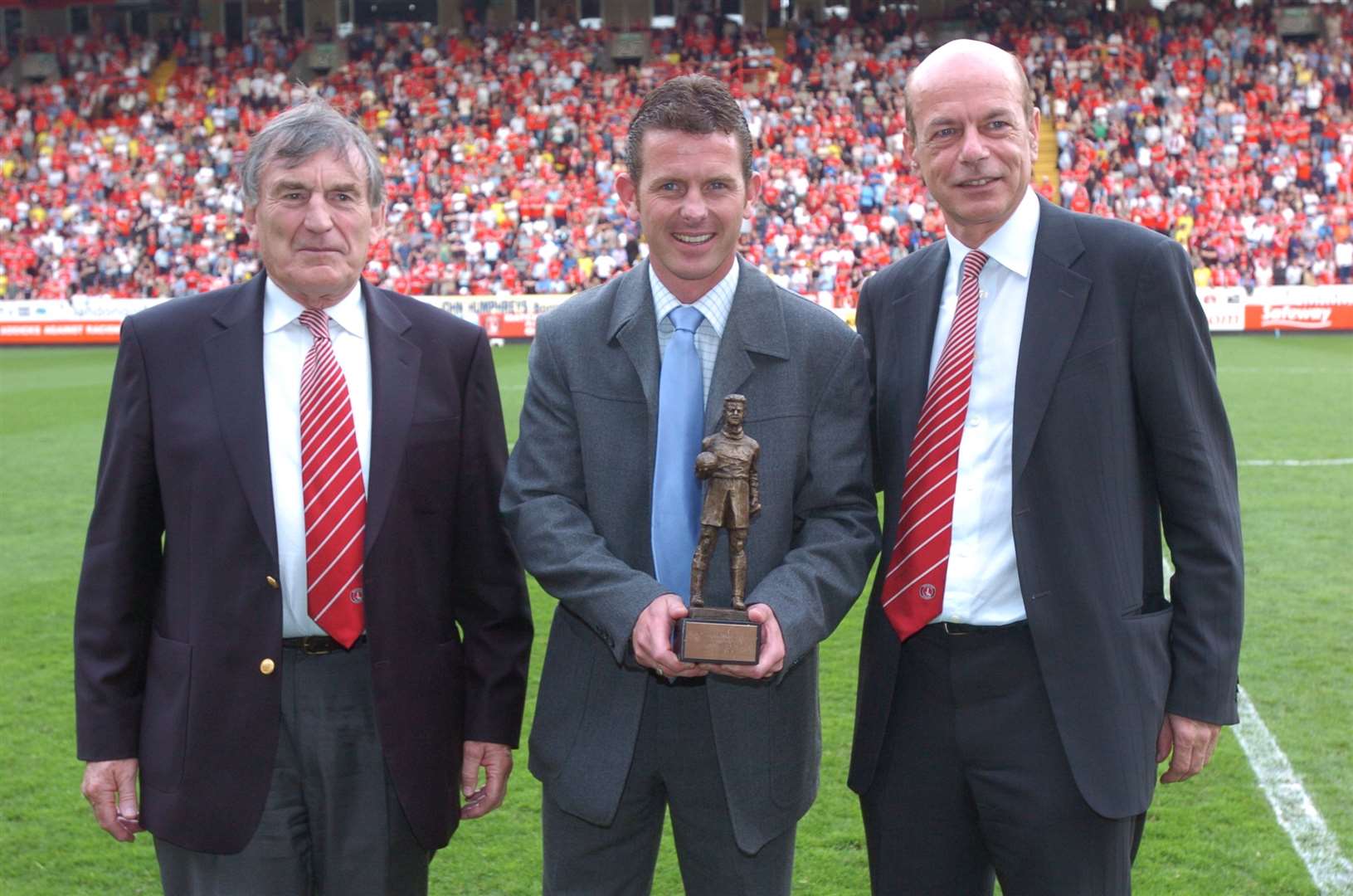 Derek Ufton, left, with Mark Kinsella and Richard Murray at the Charlton Centenary Awards at The Valley in 2005. Picture: Matthew Walker