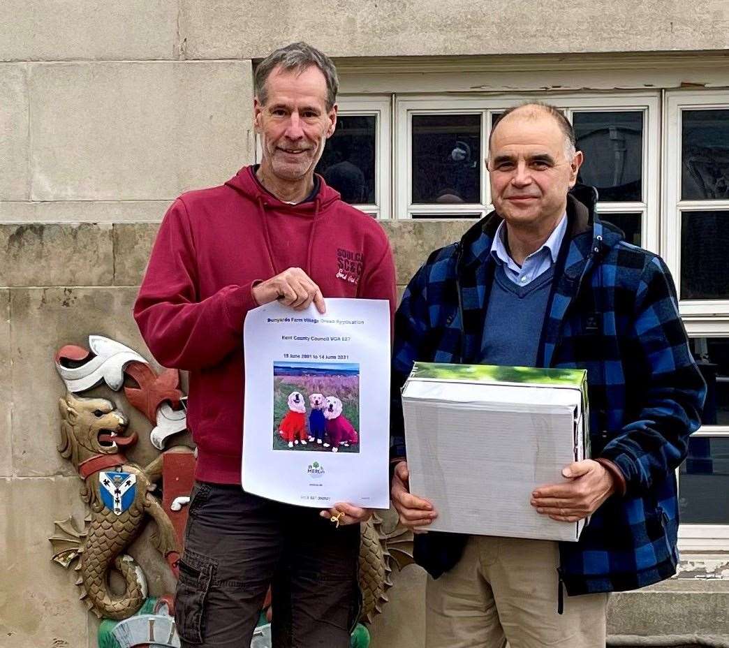 Duncan Edwards and Chris Passmore delivering documents to County Hall in Maidstone where an application on whether to grant Bunyards Farm village green status was heard