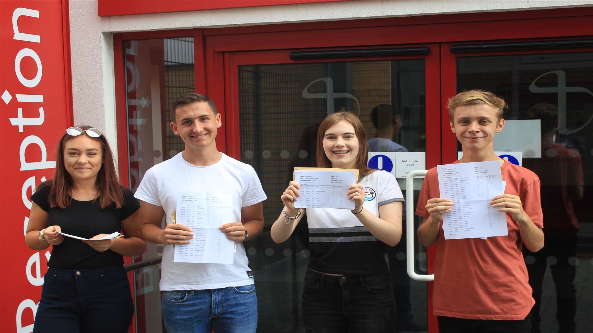 Holly, Charlie, Ellie and Lewis collected their results at The John Wallis Academy