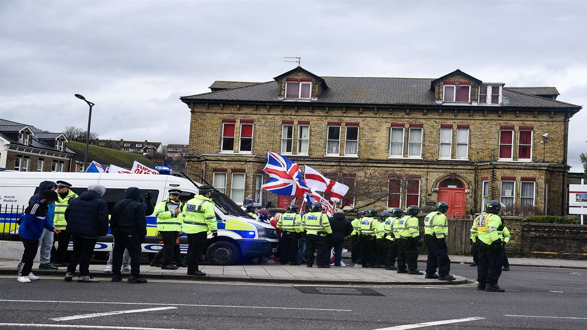 Police hold the line of right-wing protesters before they start their march through Dover. Picture: Alan Langley