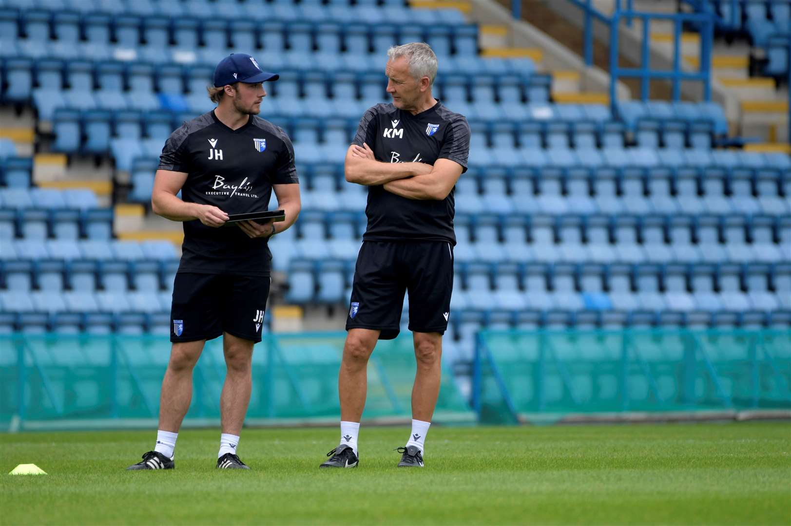 Sports science intern James Hoyte with Head of Academy Coaching, Keith Millen chat during the session Picture: Barry Goodwin