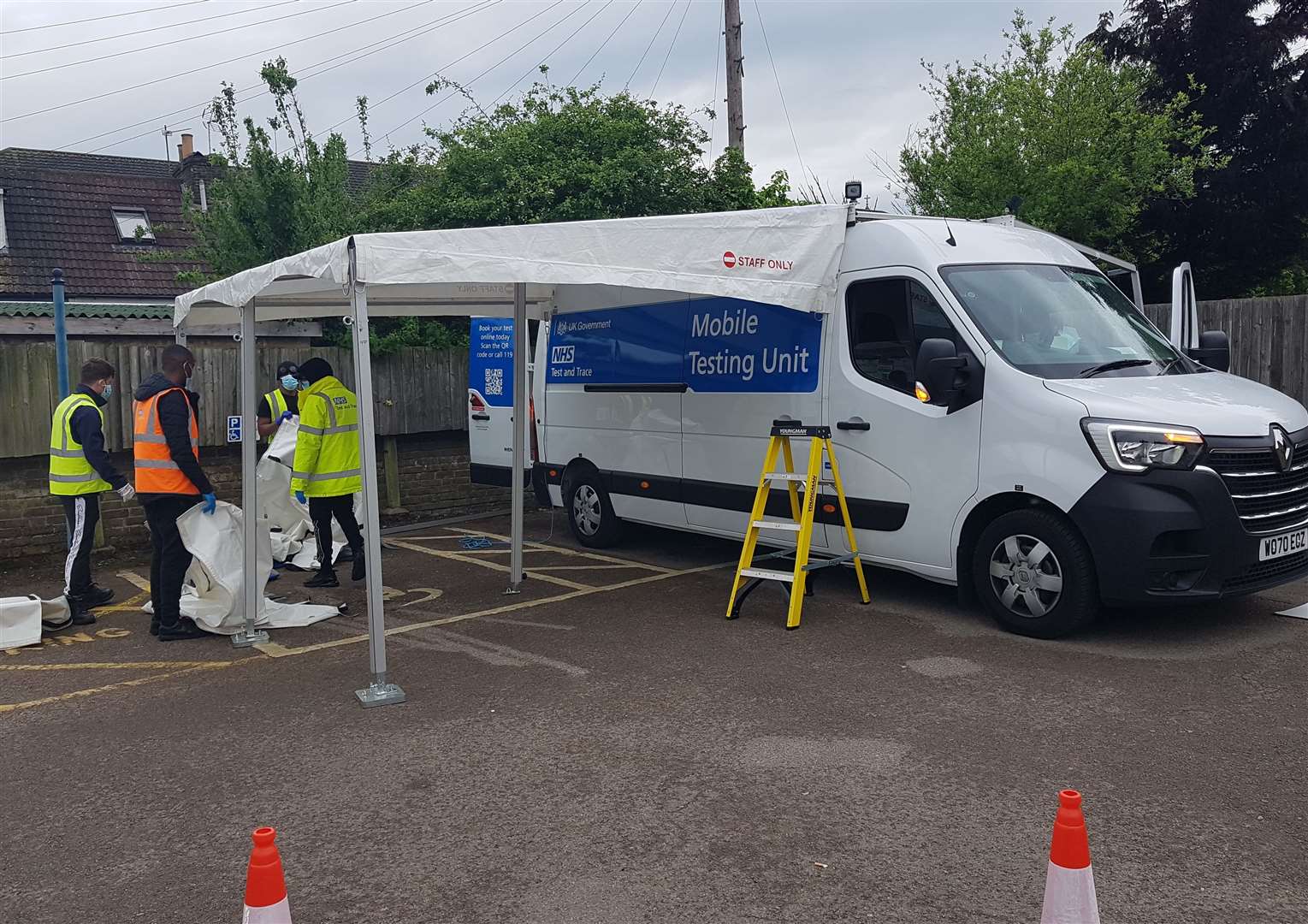 The mobile testing unit in the car park at Quaker Meeting House in Maidstone being set up