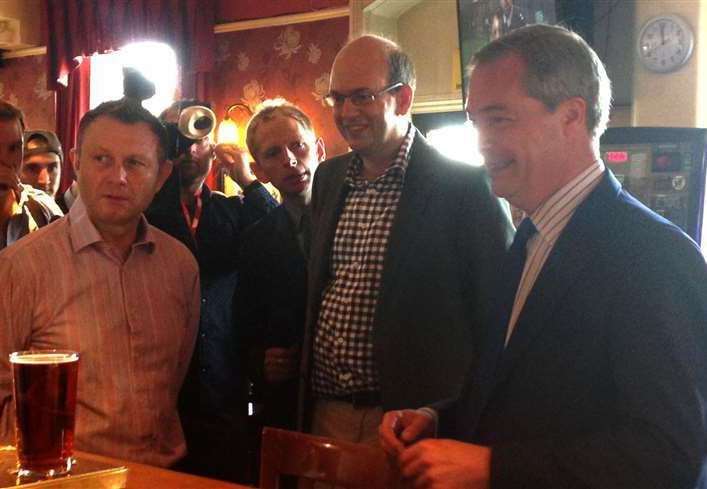 Nigel Farage pops in for a pint during the 2014 by-election campaign