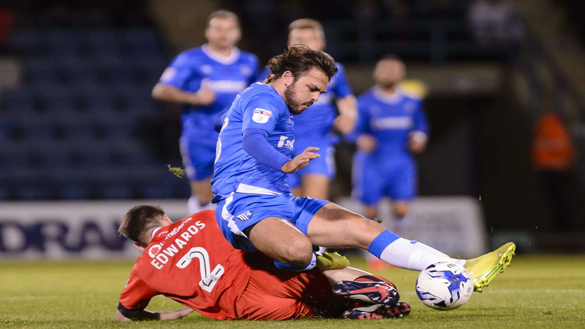 Bradley Dack stopped in his tracks by Joe Edwards Picture: Andy Payton