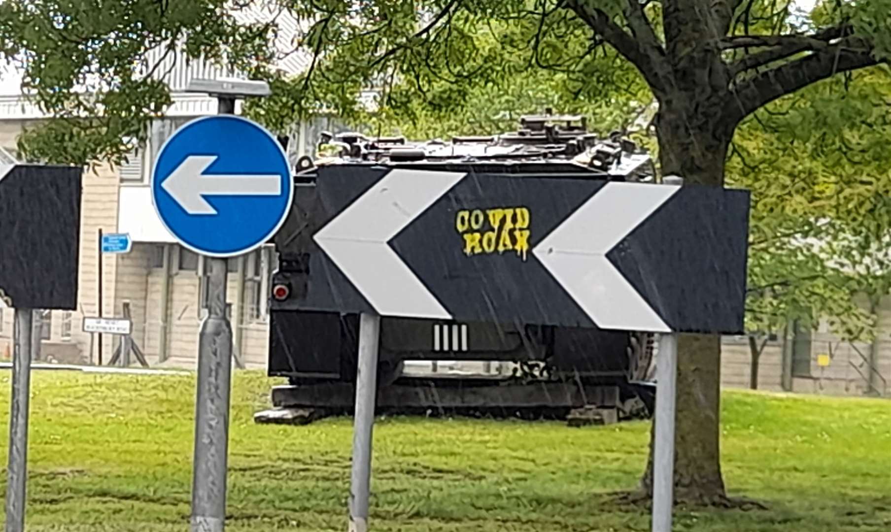 'Covid hoax' has been spray painted on the 'tank roundabout' in Chart Road
