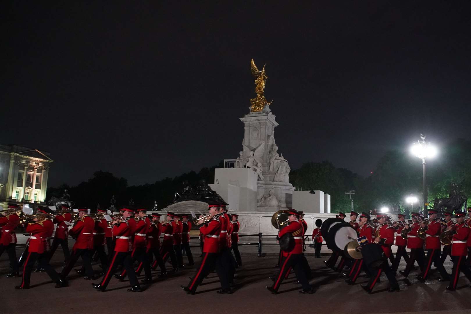 Drums and trumpets accompanied the procession and could be heard from streets away, as the rest of the city remained largely silent (Gareth Fuller/PA)
