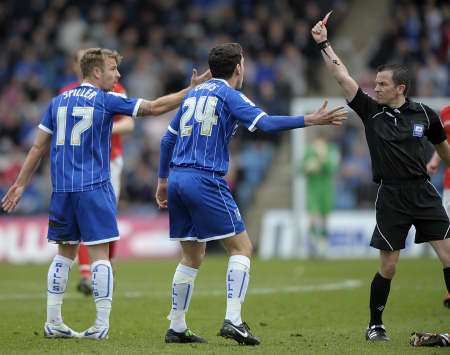 Danny Spiller is shown the red card against Crewe