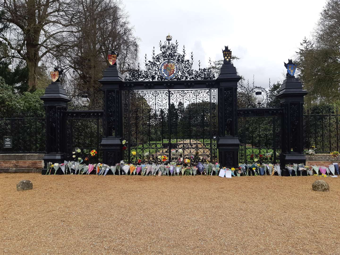 Floral tributes at the Norwich gates to the Sandringham estate