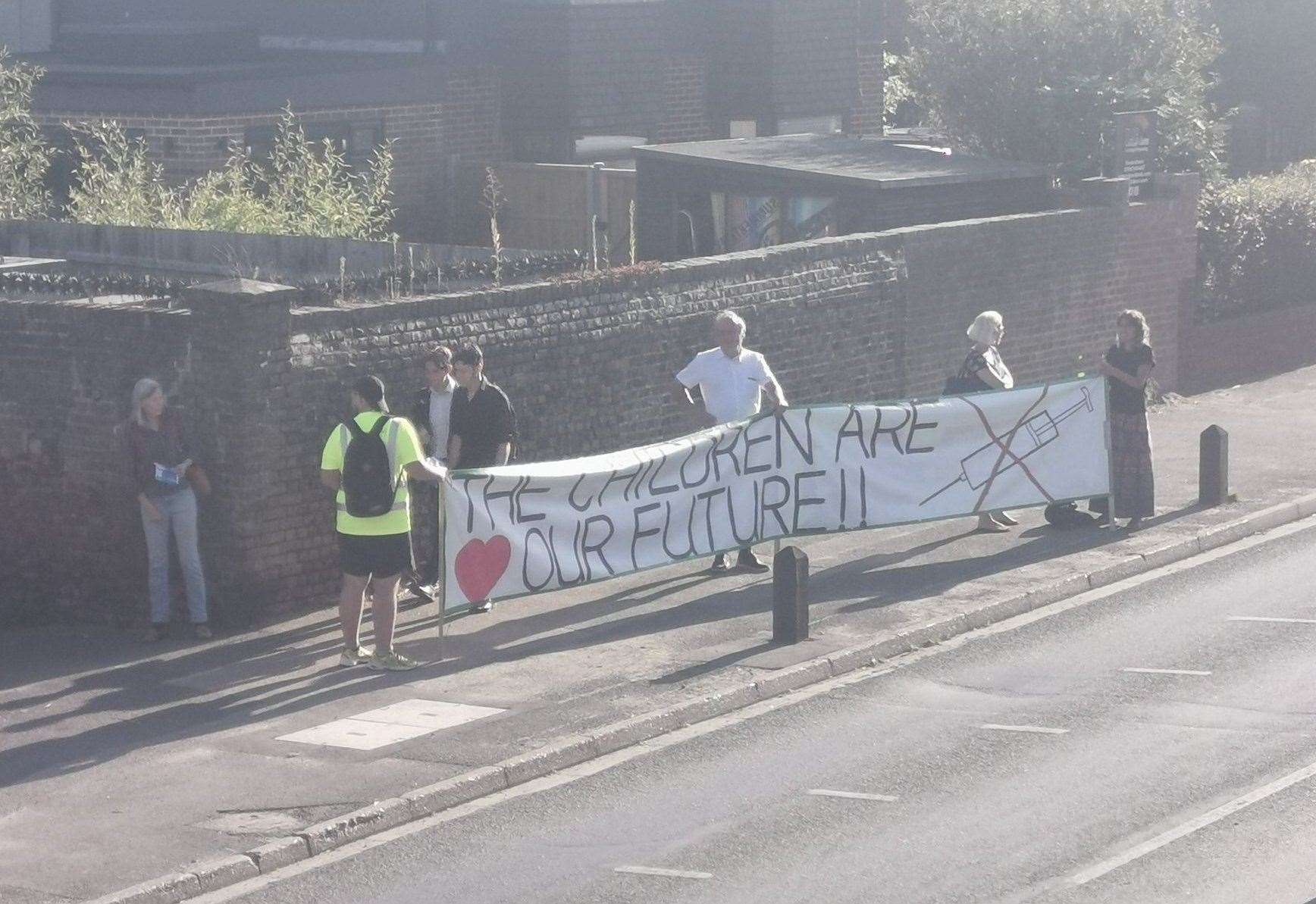 Anti-vaxxers outside The Abbey School in Faversham. Picture: Hannah Perkin