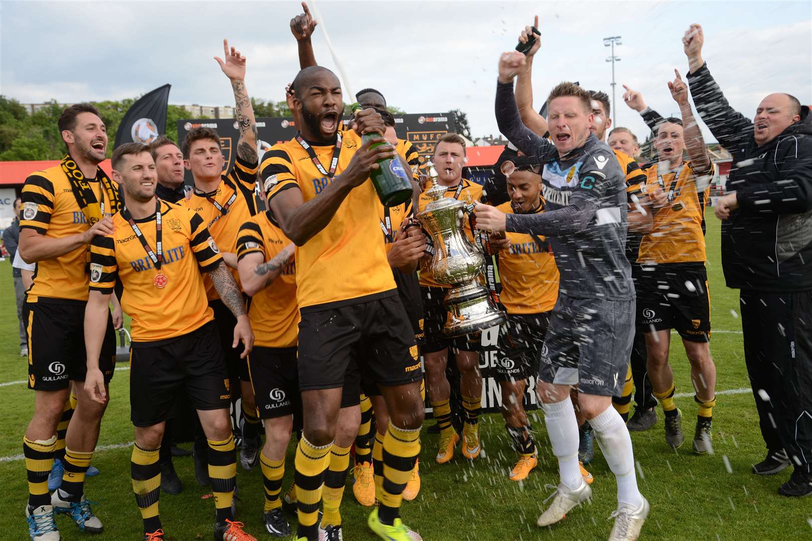Maidstone, celebrating their 2016 play-off victory, are targeting a quick return to the National League Gary Browne