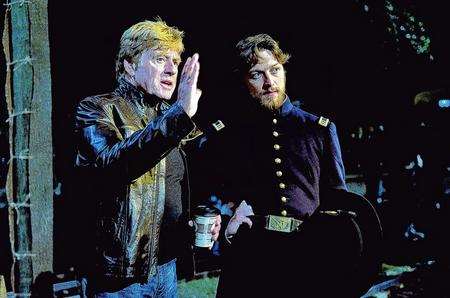 Robert Redford and James McAvoy on the set of The Conspirator. Picture: PA Photo/UPI Media