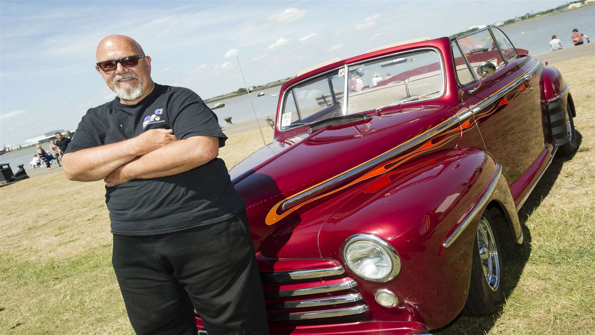 Pete Angell, with a 1947 Ford Super Deluxe convertible at the 169th Gravesend Regatta and Fusion Festival