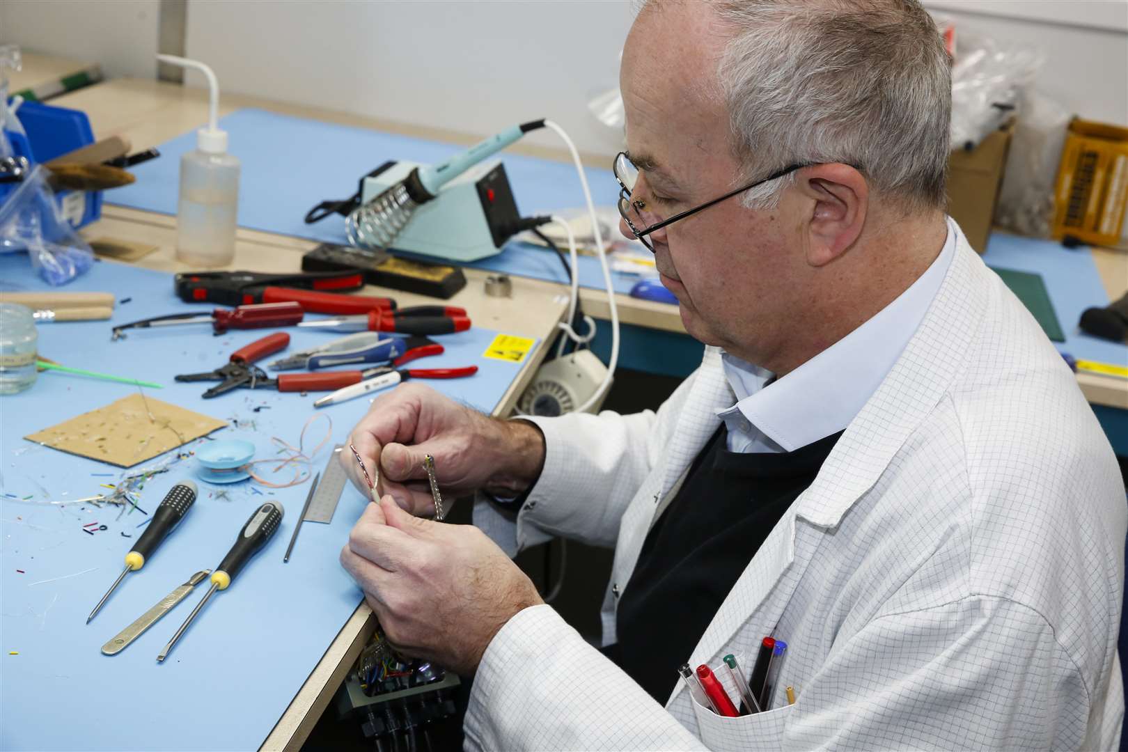 Sean Farrell wiring a loom