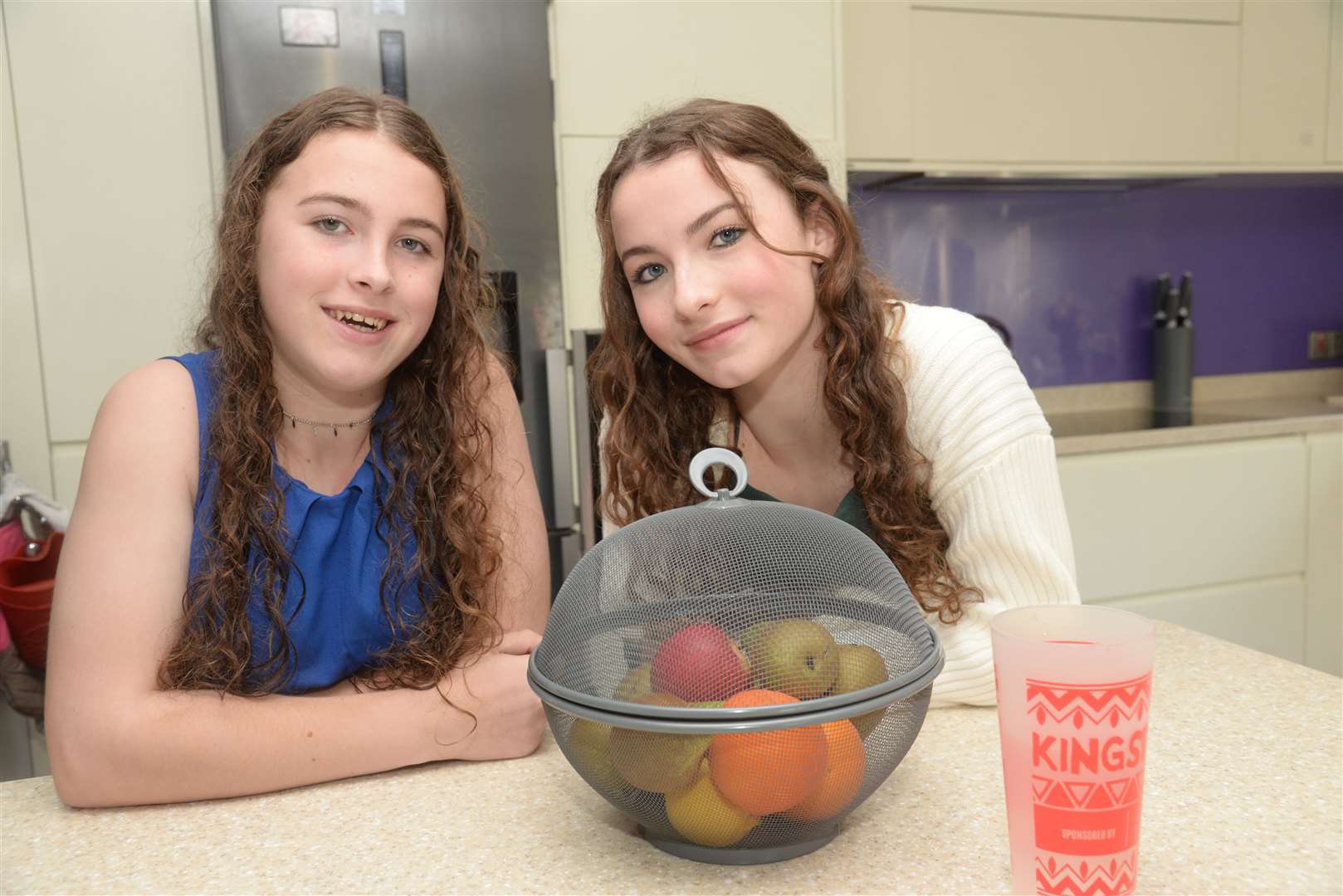 Olivia Evans from St Margarets-at-Cliffe, who has been chosen as the Wards Children's Award Young Fundraiser, pictured with sister Emily-Rose Evans. Picture:Chris Davey.