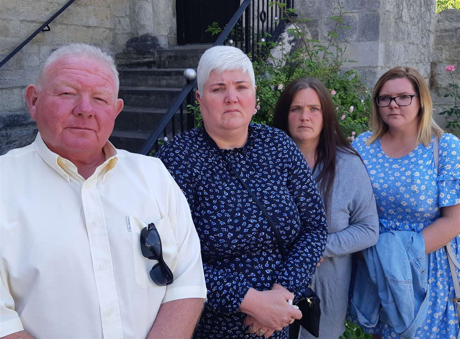 Alex Holland's parents Mark and Rachel Holland and his sisters Louise Coleman and Victoria Holland-Bastable outside the coroner's court at the end of last year's inquest