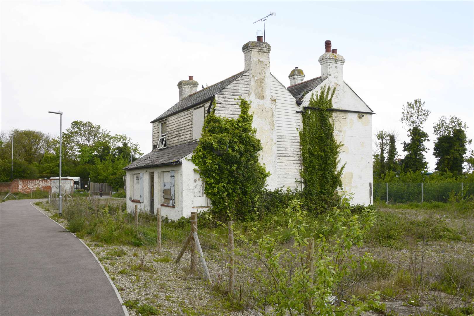 Ian Morris is calling for something to be done about two derelict buildings near Blacksole Bridge