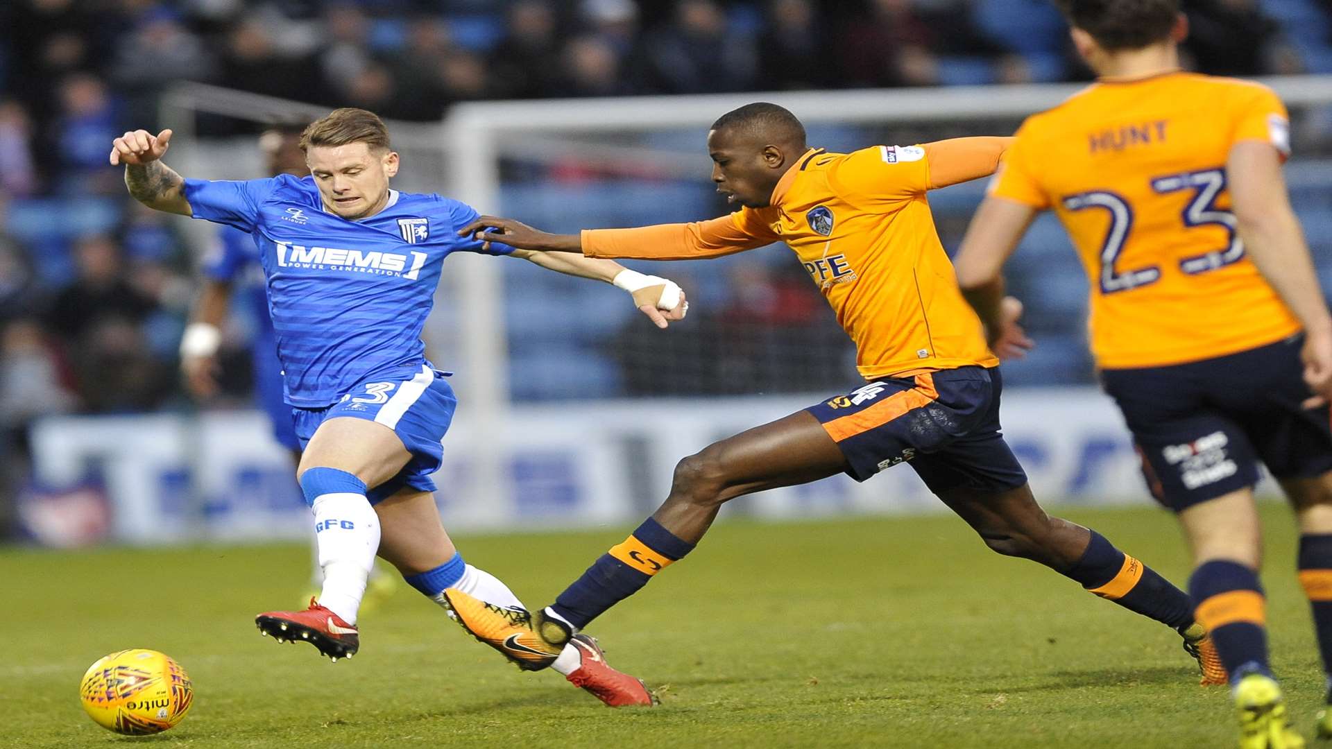 Mark Byrne does battle with Oldham's Ousmane Fane on Saturday Picture: Ady Kerry