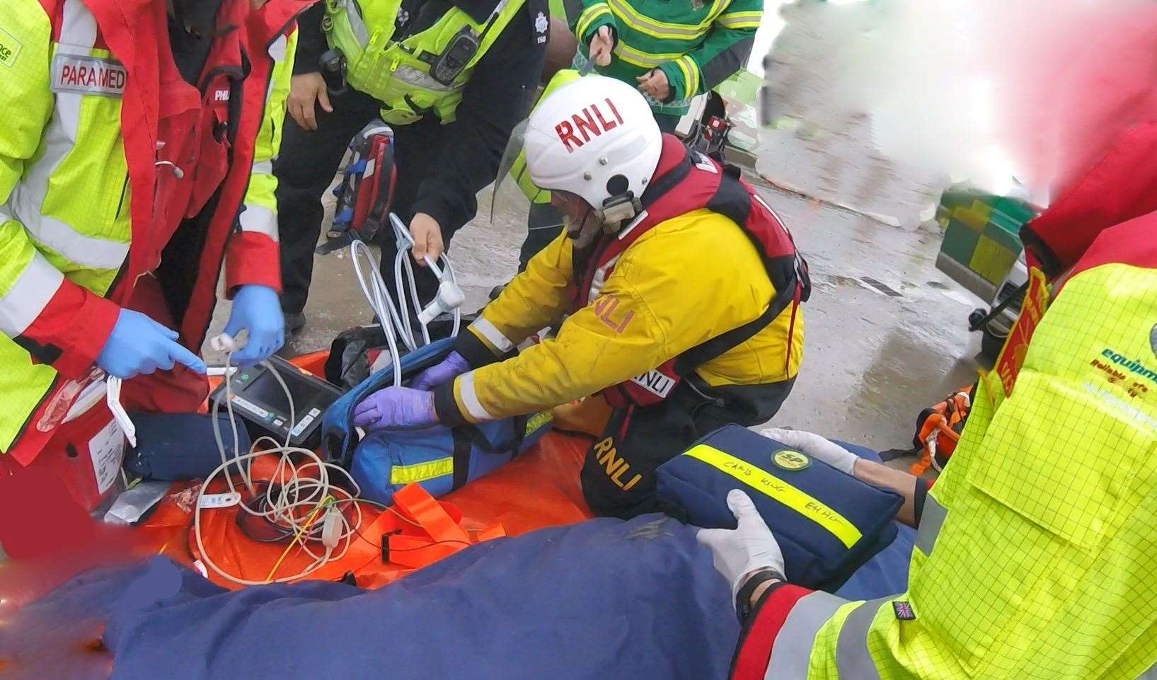 Gravesend lifeboat crews giving casualty care alongside paramedics
