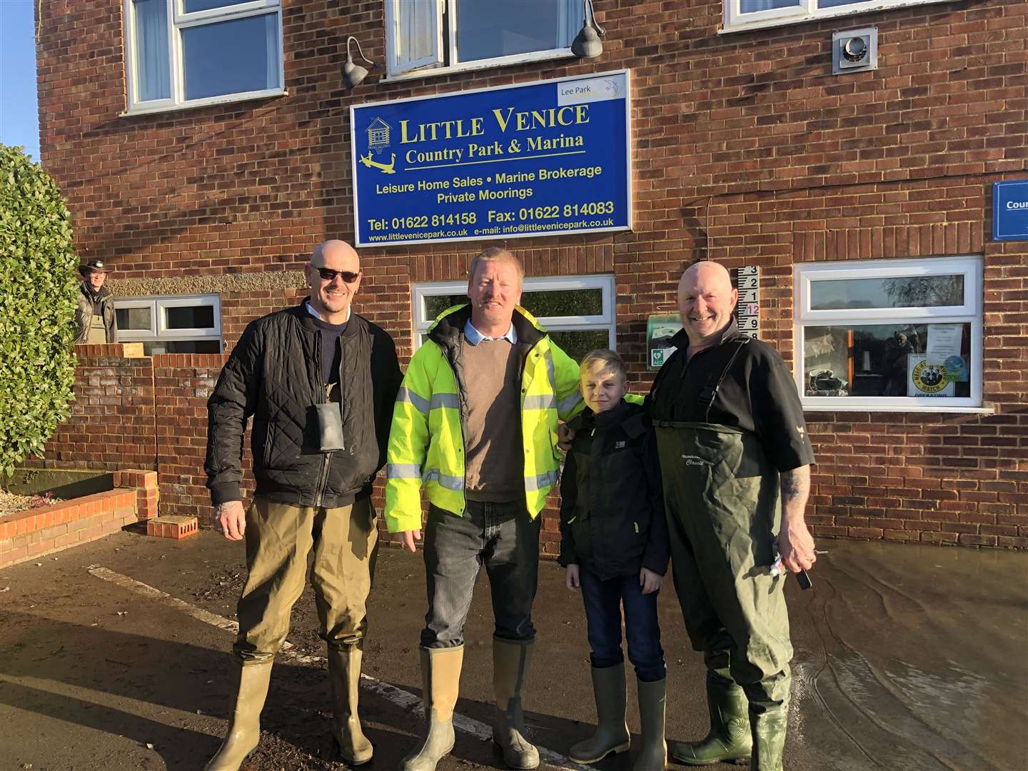 Surveying the flood damage at Little Venice Country Park. L-R: Vinnie, Albert Lee and his son Edward and Frank