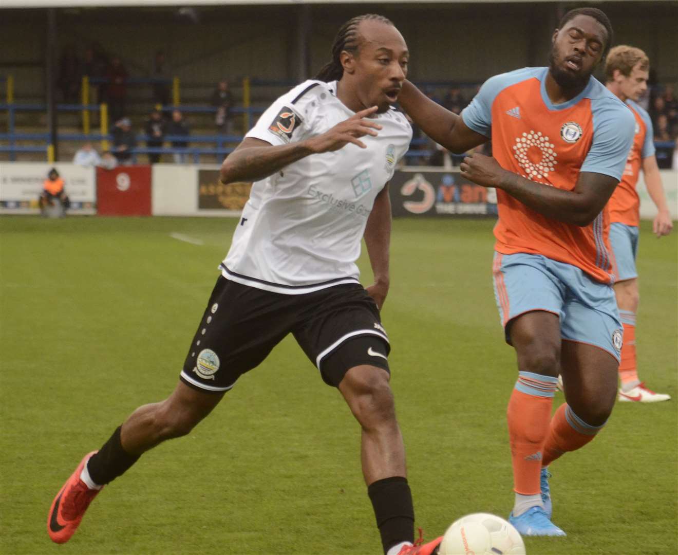 Dover's Ricky Modeste comes away from Halifax defender Jerome Binnon-Williams. Picture:Chris Davey.