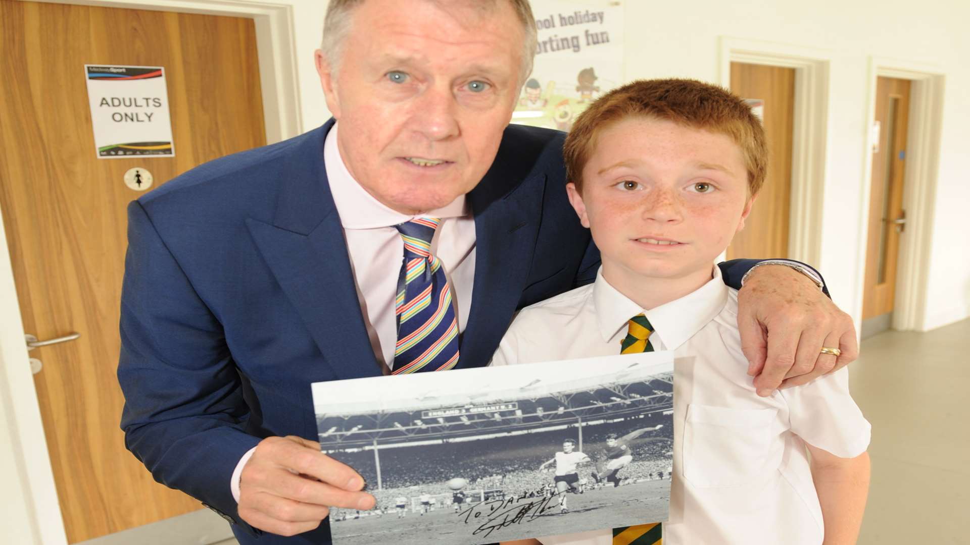Daniel gets a signed photo from Geoff Hurst at Strood Sports Centre