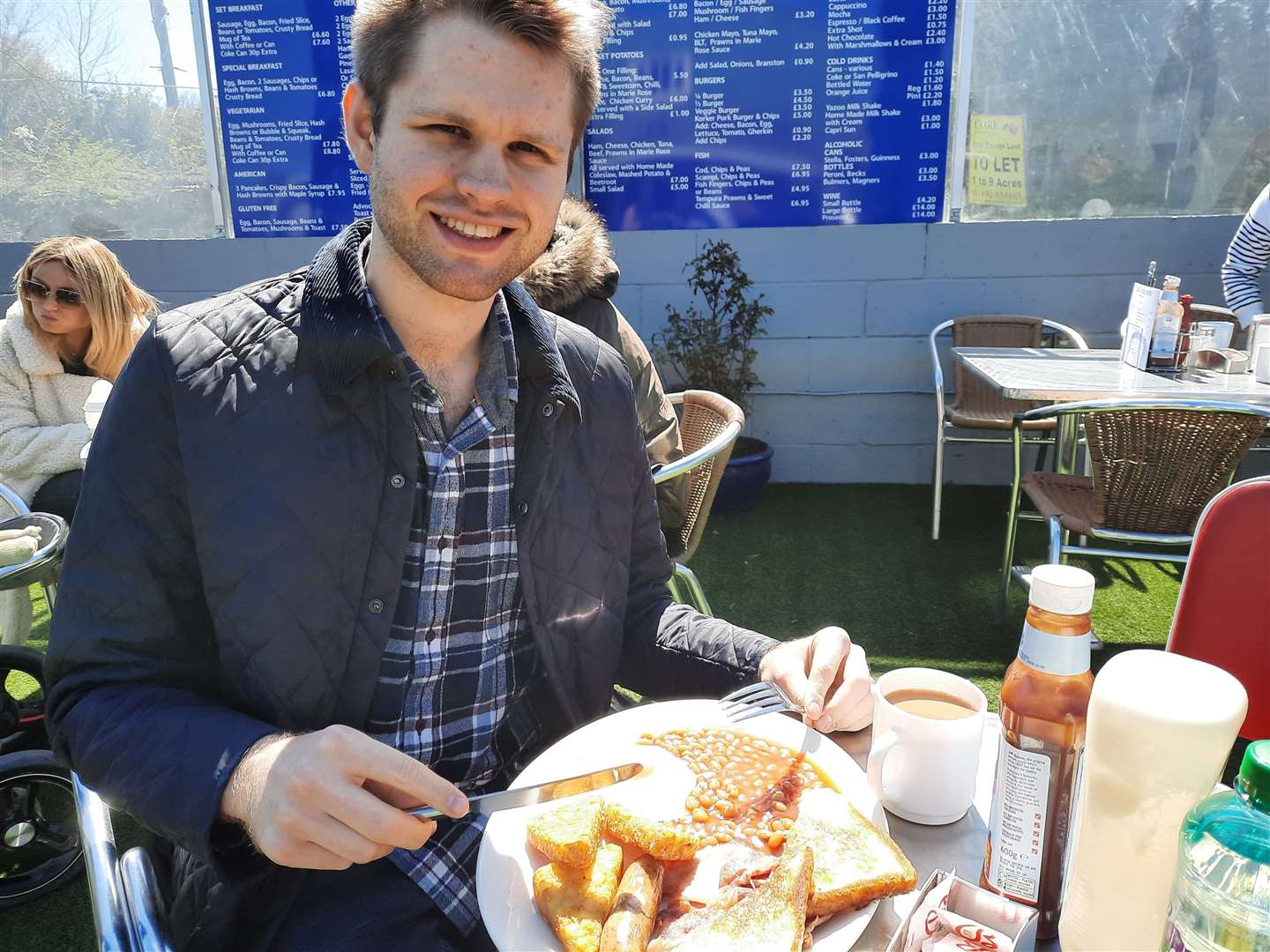 Jack with his fry-up from the Airport Café