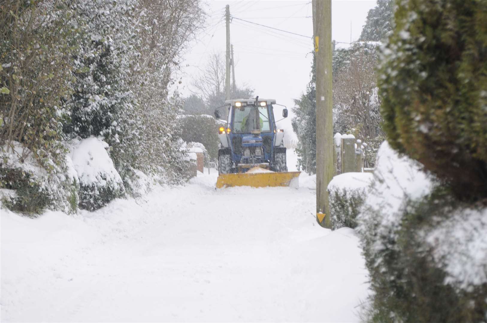 A snow plough clearing Nursery Lane, Whitfield, near Dover.