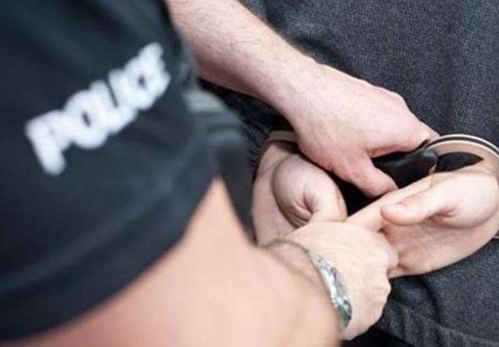 A man has been arrested on suspicion of taking a purse. Stock picture